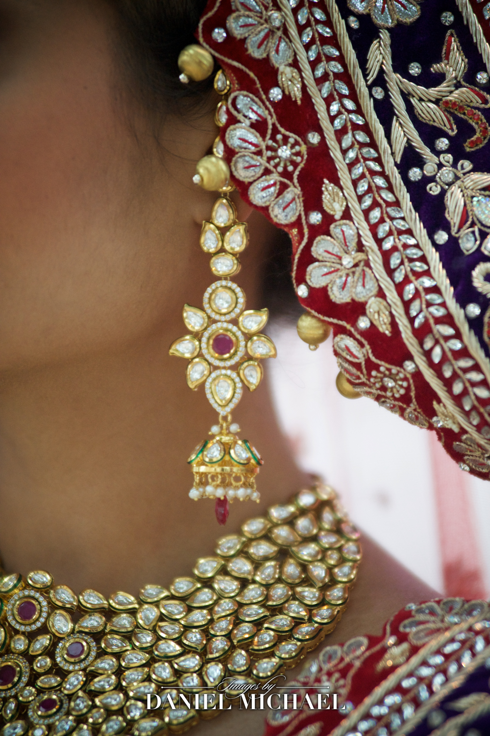 Close-up of exquisite South Asian wedding earrings, necklace, and headpiece